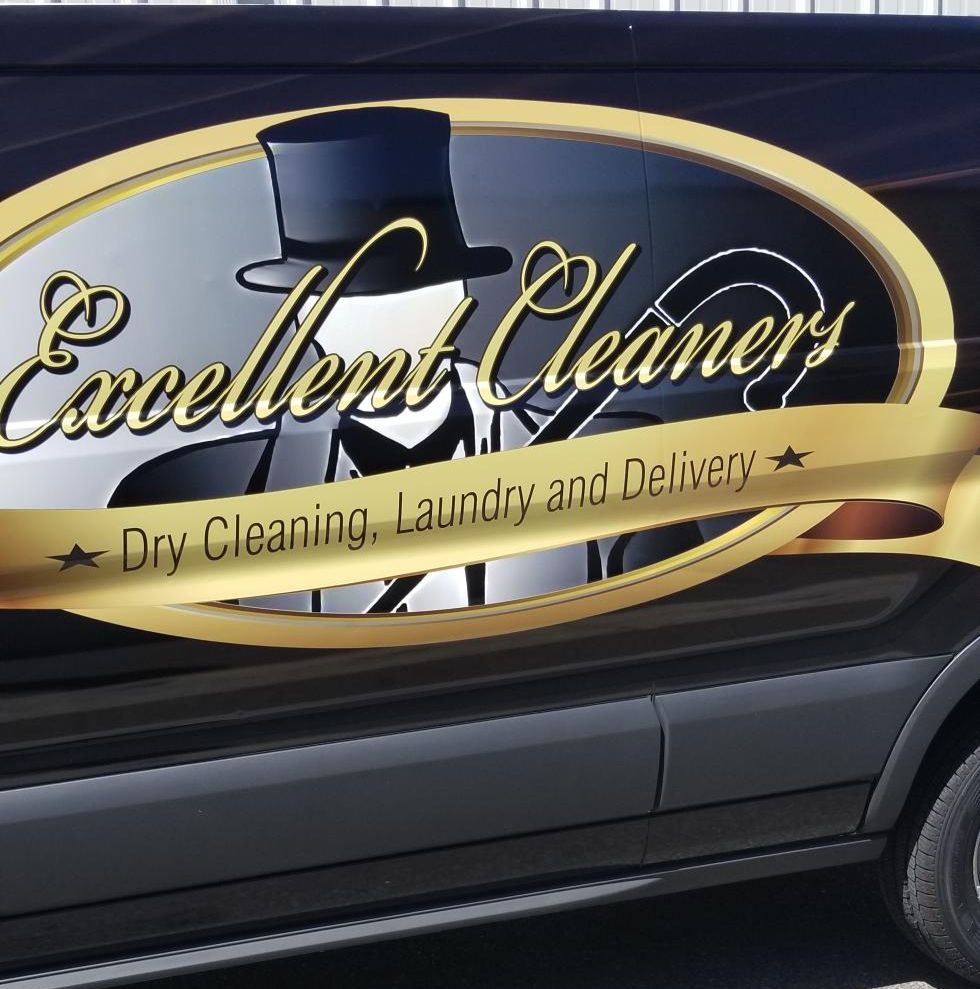Excellent Cleaners lettering on a delivery van