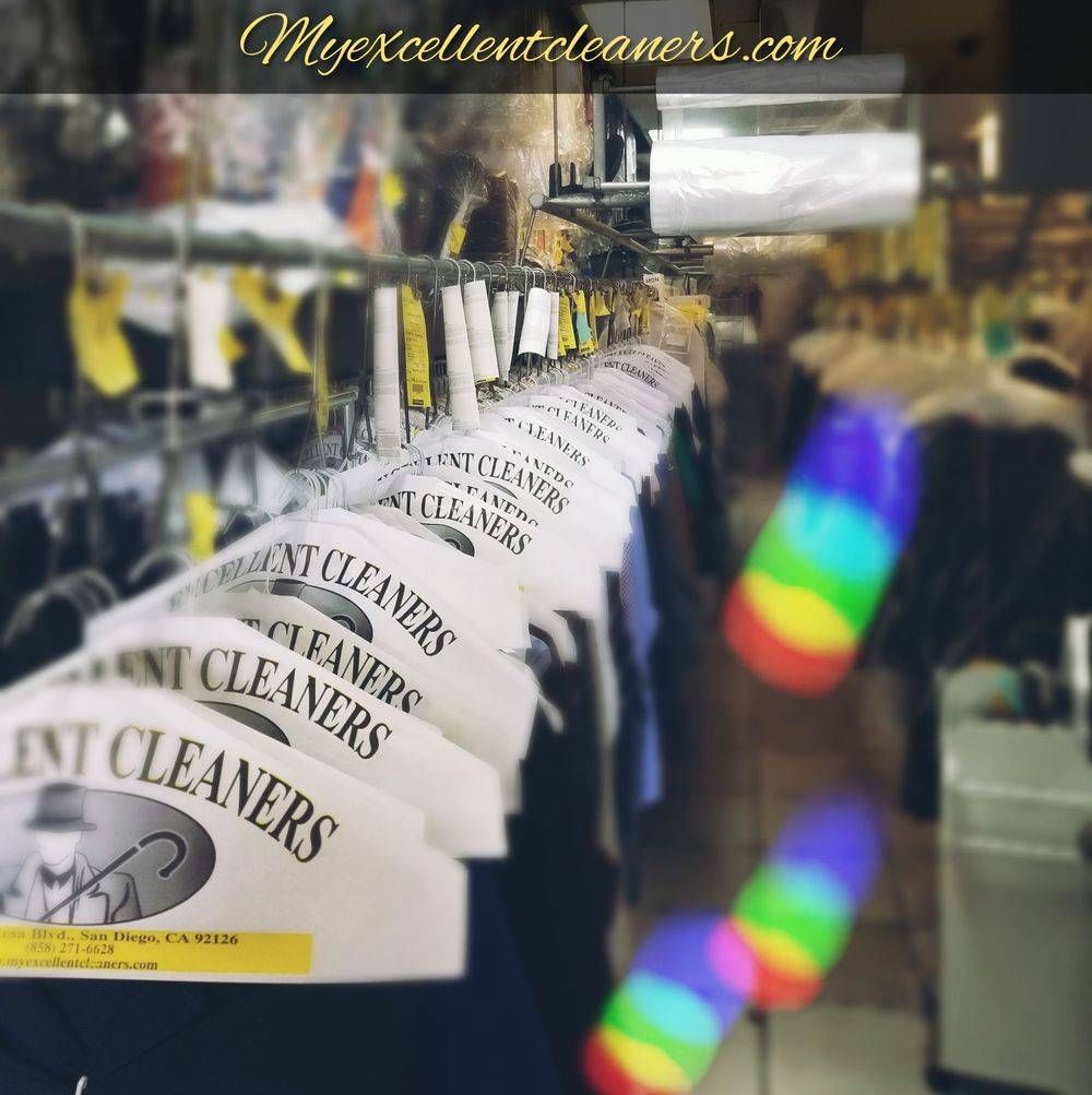 Cleaned garments bagged and hung at Excellent Cleaners